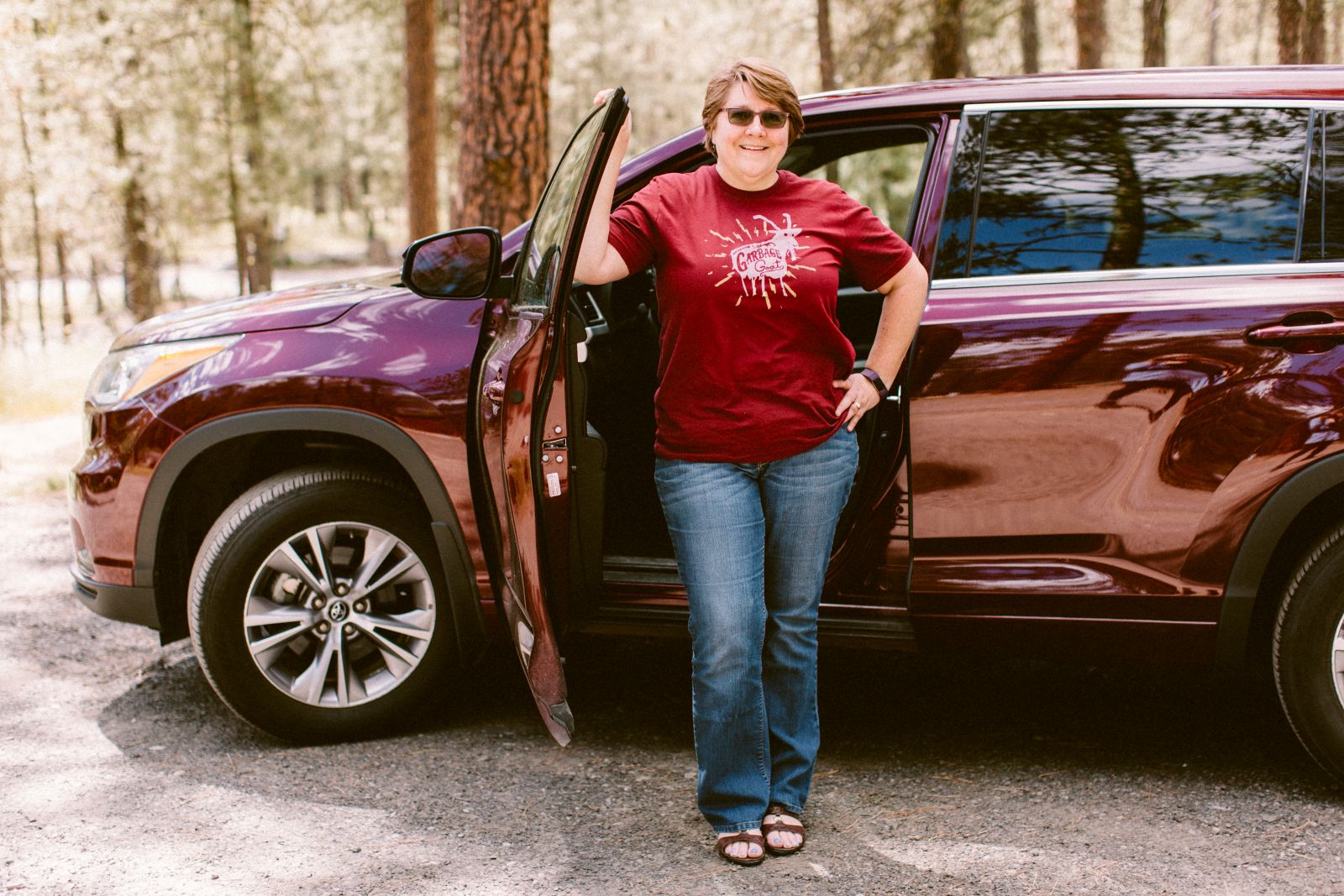 woman next to car financed by Canopy CU