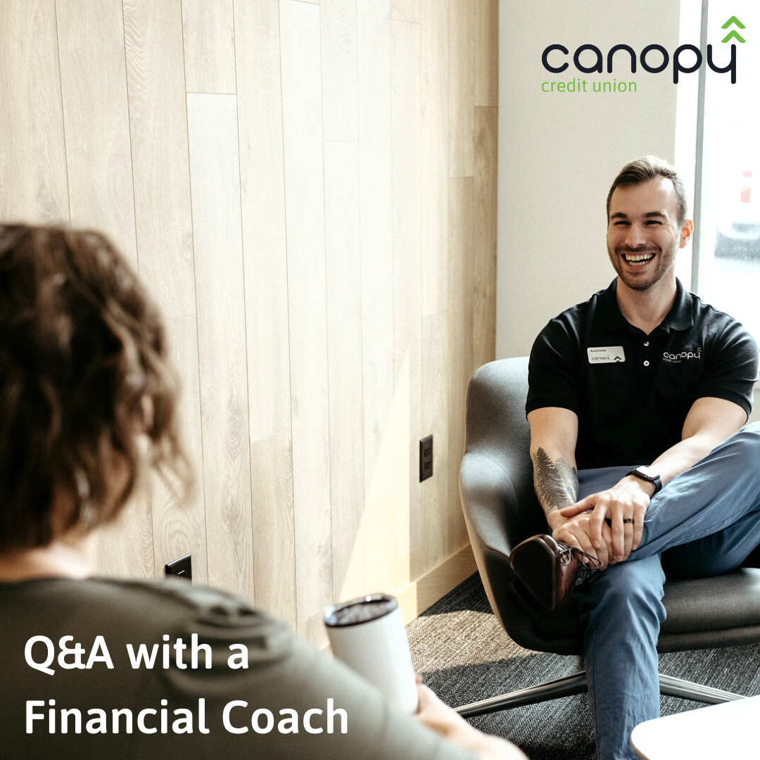 A man smiles and talks to a women. Text reads, Q and A with a financial coach, Canopy Credit Union