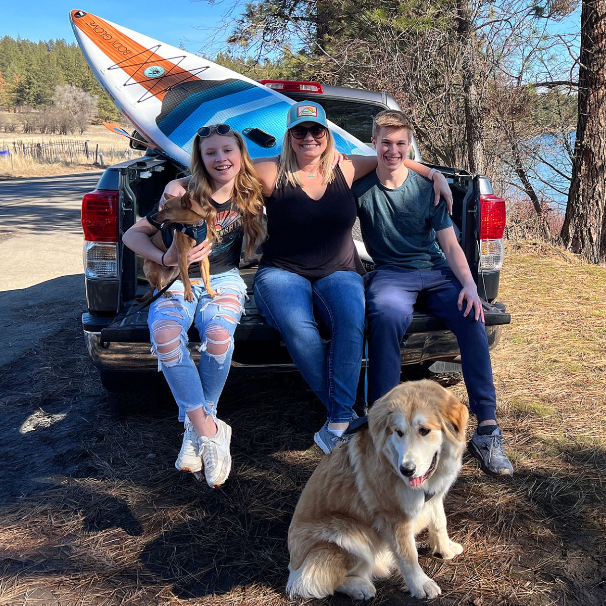 Teenagers with mother on a kayaking trip