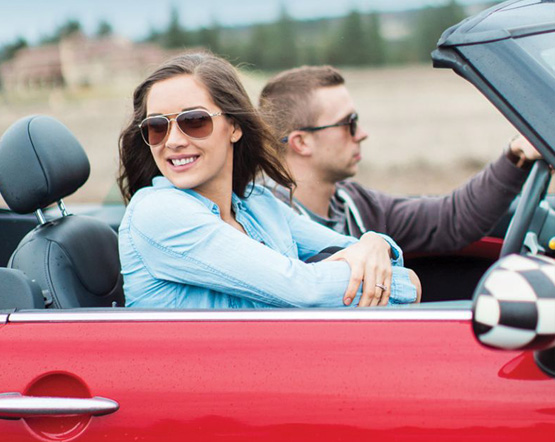 couple in convertible car